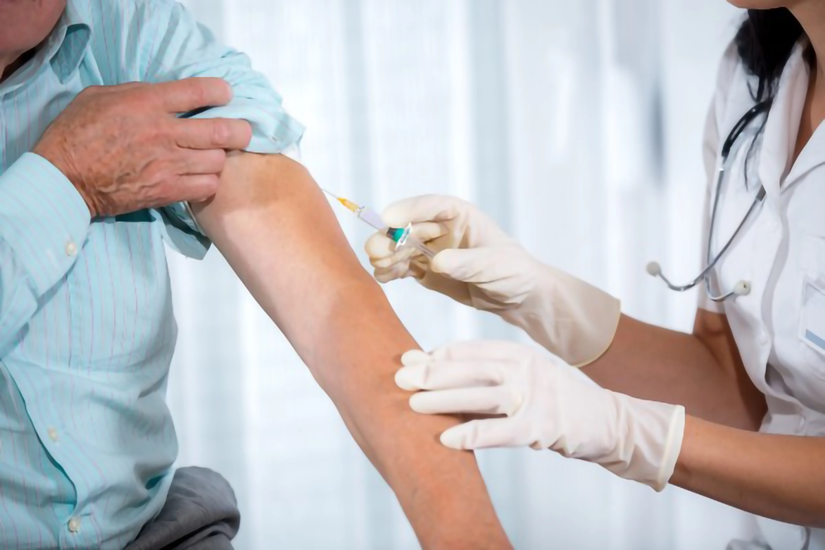 Image of a patient receiving a flu vaccine